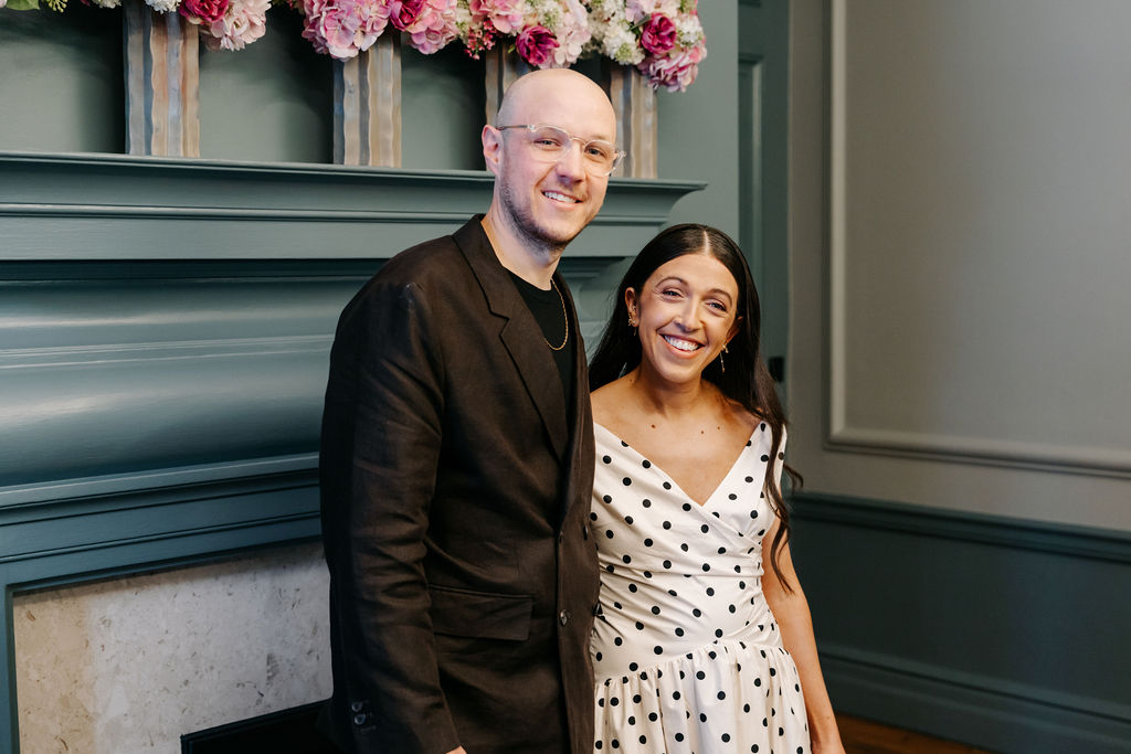 Josh and Frankie smiling together during their wedding ceremony